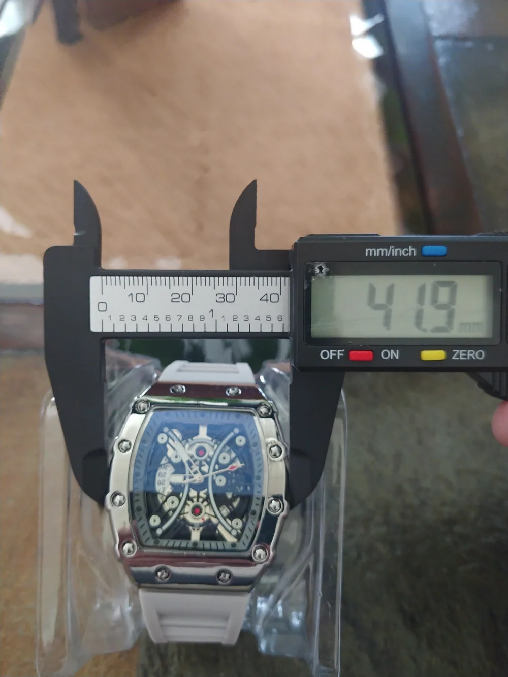 White and Silver Skeleton Sport Watch With Date.